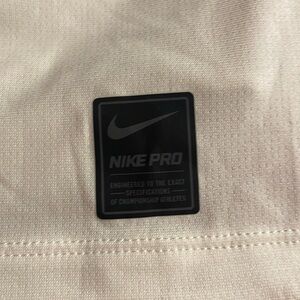 Nike padded compression shirt for football - size L